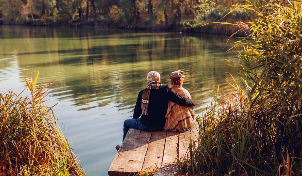 fall couple at lake