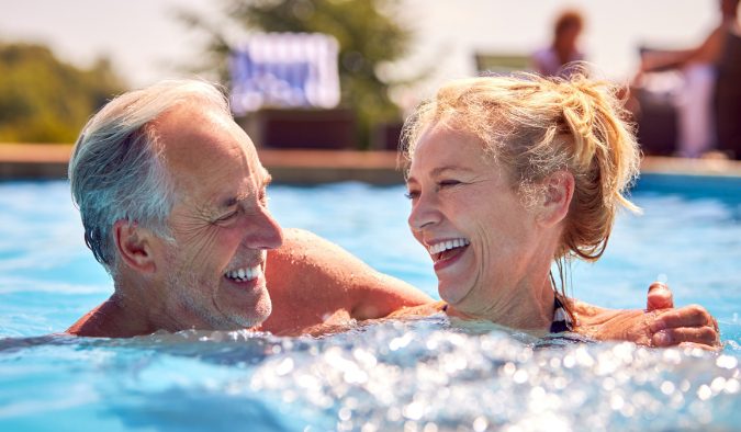 event image mature white couple in pool