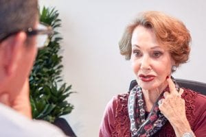a hearing loss patient at her ear doctor appointment