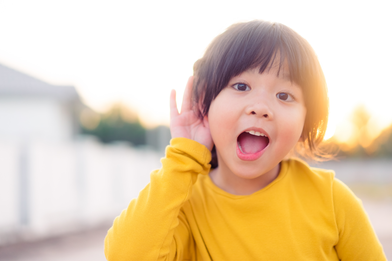 asian girl hand ear listening