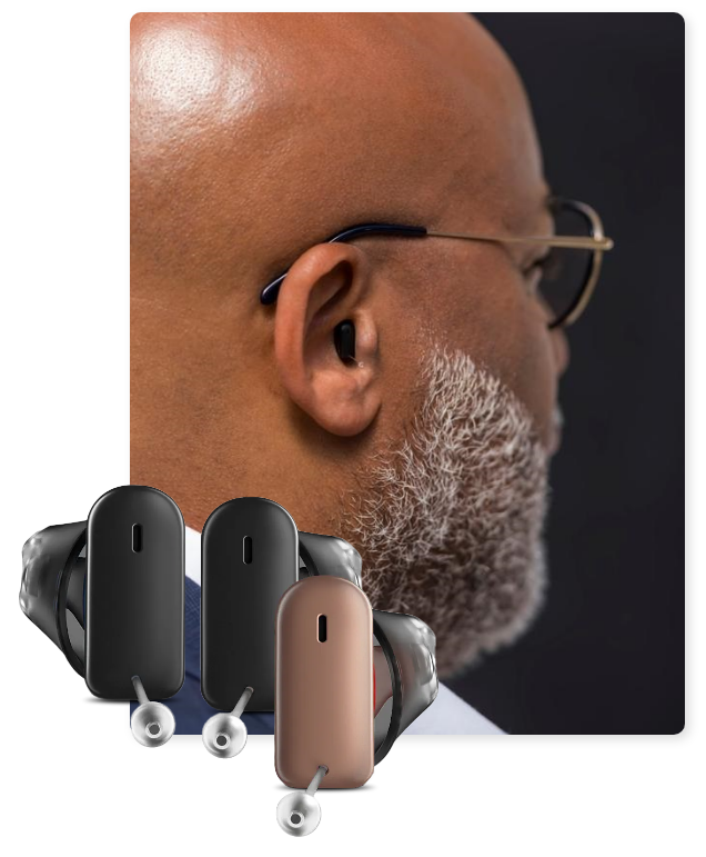 ITC hearing aids in front adult man wearing the same hearing aid.