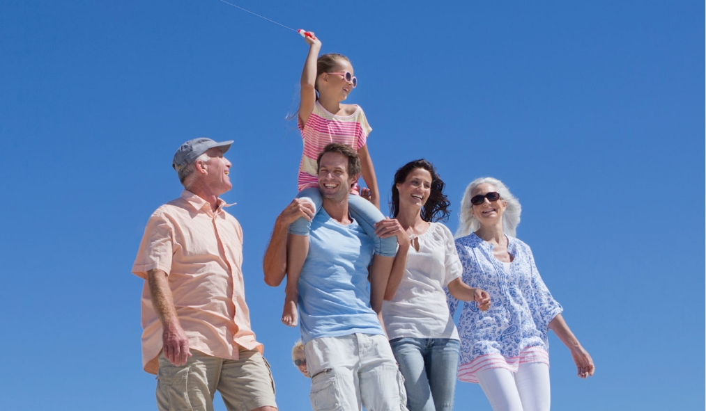 summer family walking beach