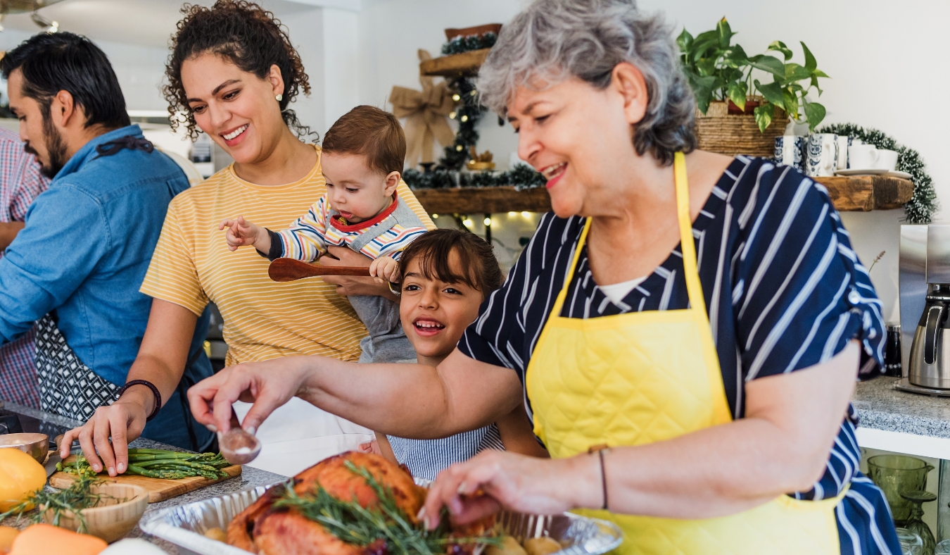hispanic family cooking autumn dinner together