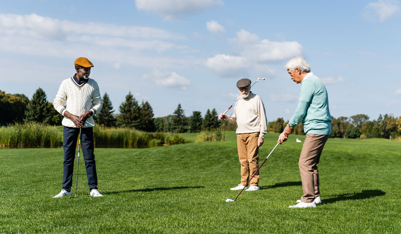 events diverse senior friends playing golf