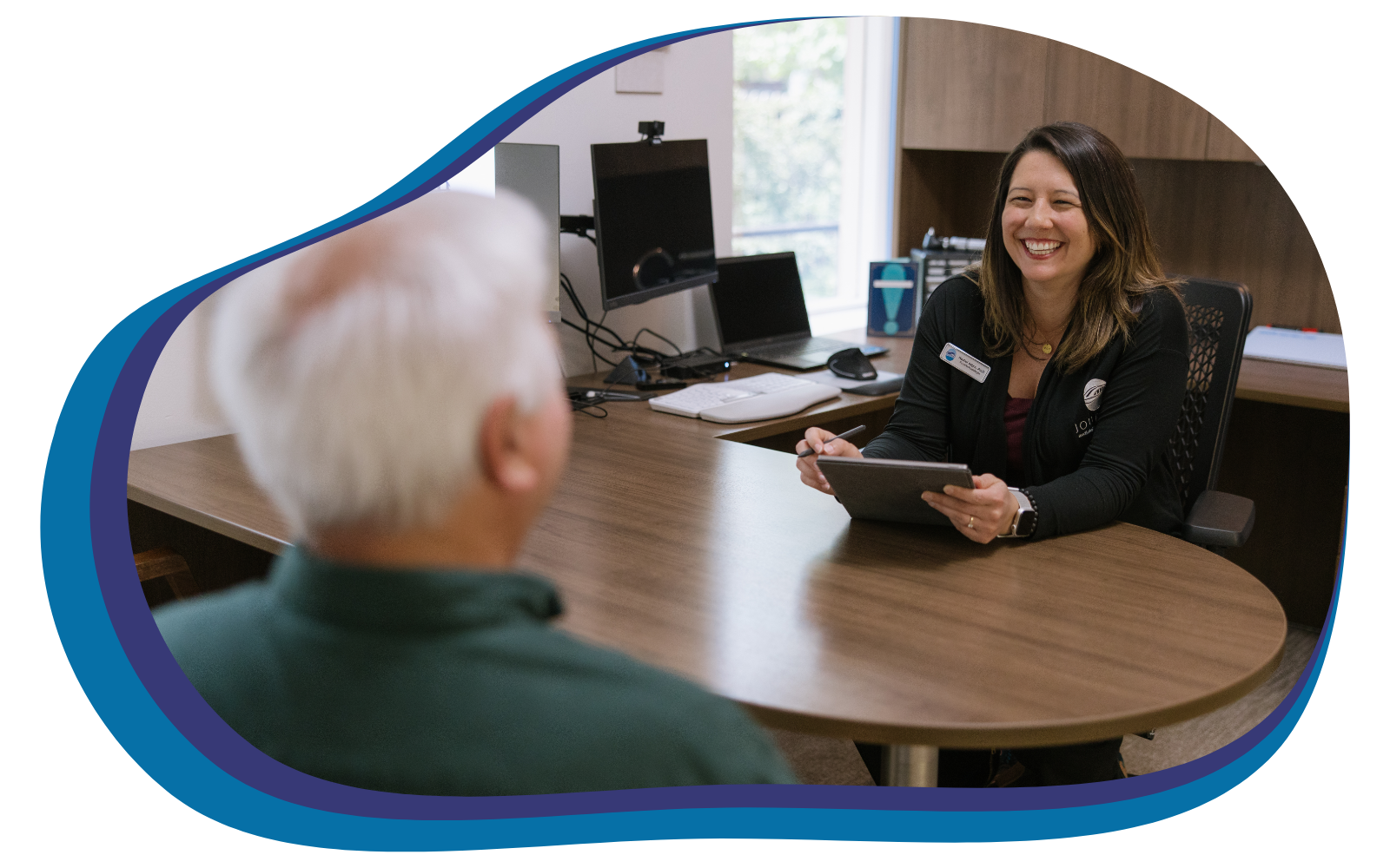 Dr Rachel talking with patient during appointment evaluation