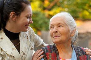 grandmother and granddaughter sharing happy personal moment together