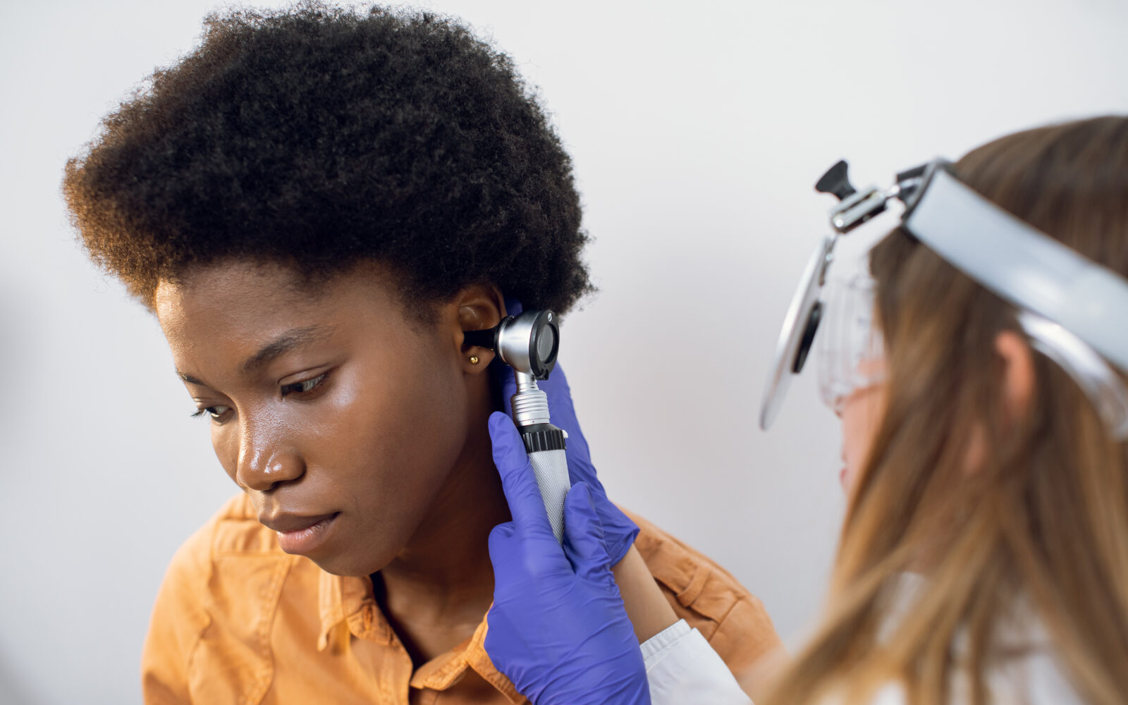 Hearing,Loss,Diagnosis,Concept ,Close,Up,Of,Female,Young,Doctor