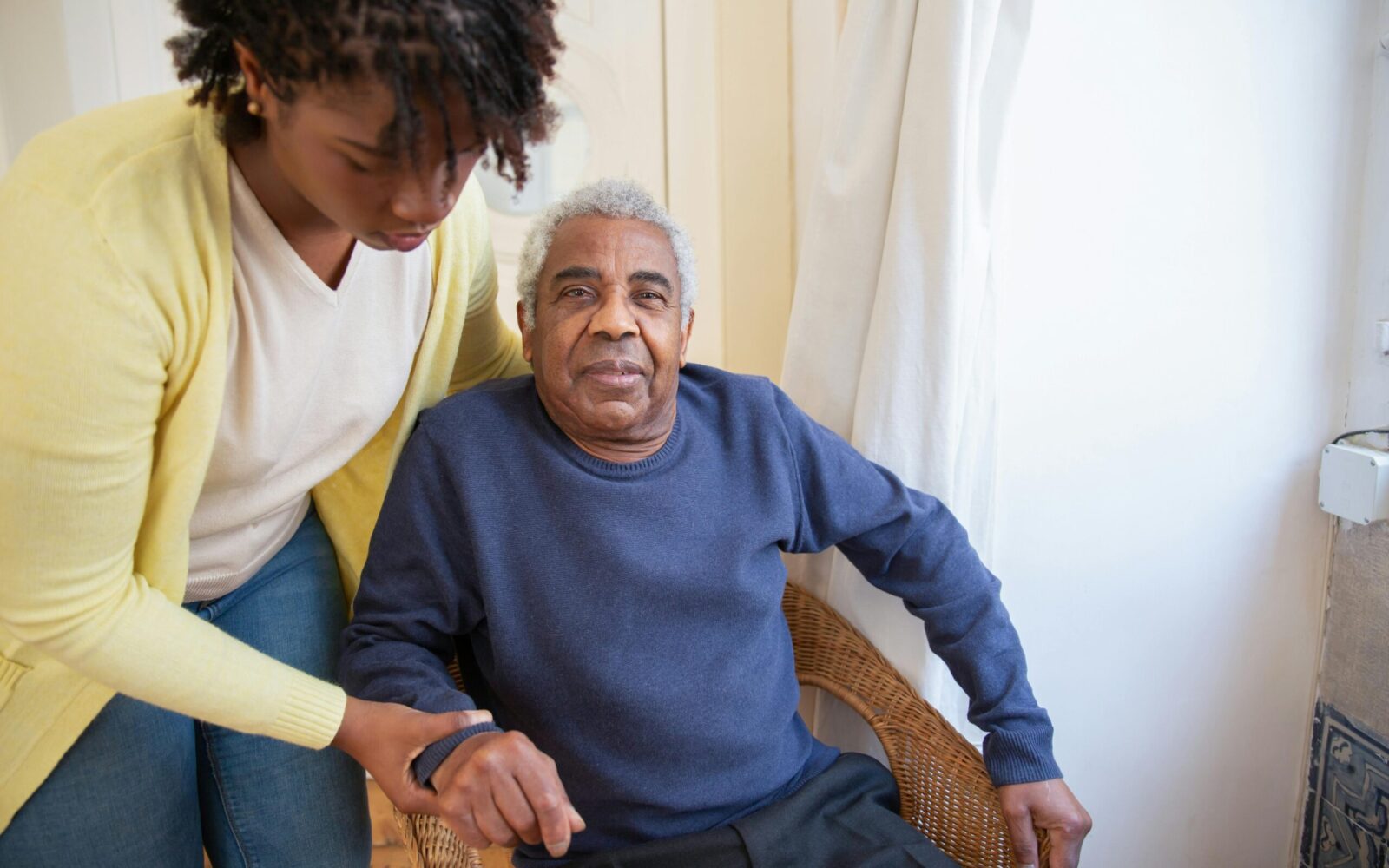 man in chair after falling