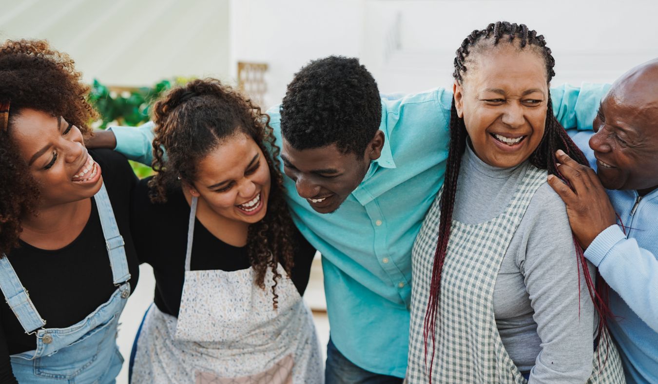 african american family group hug