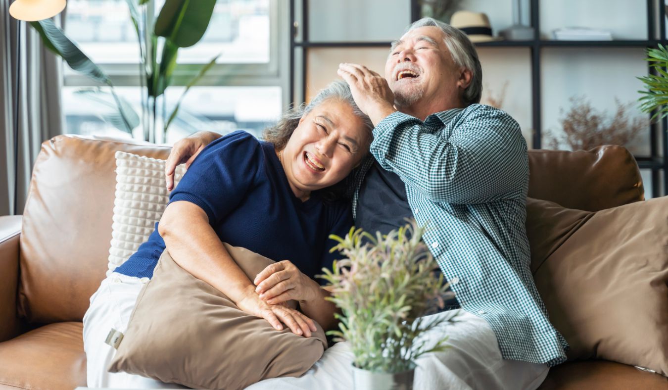 asian senior couple laughing
