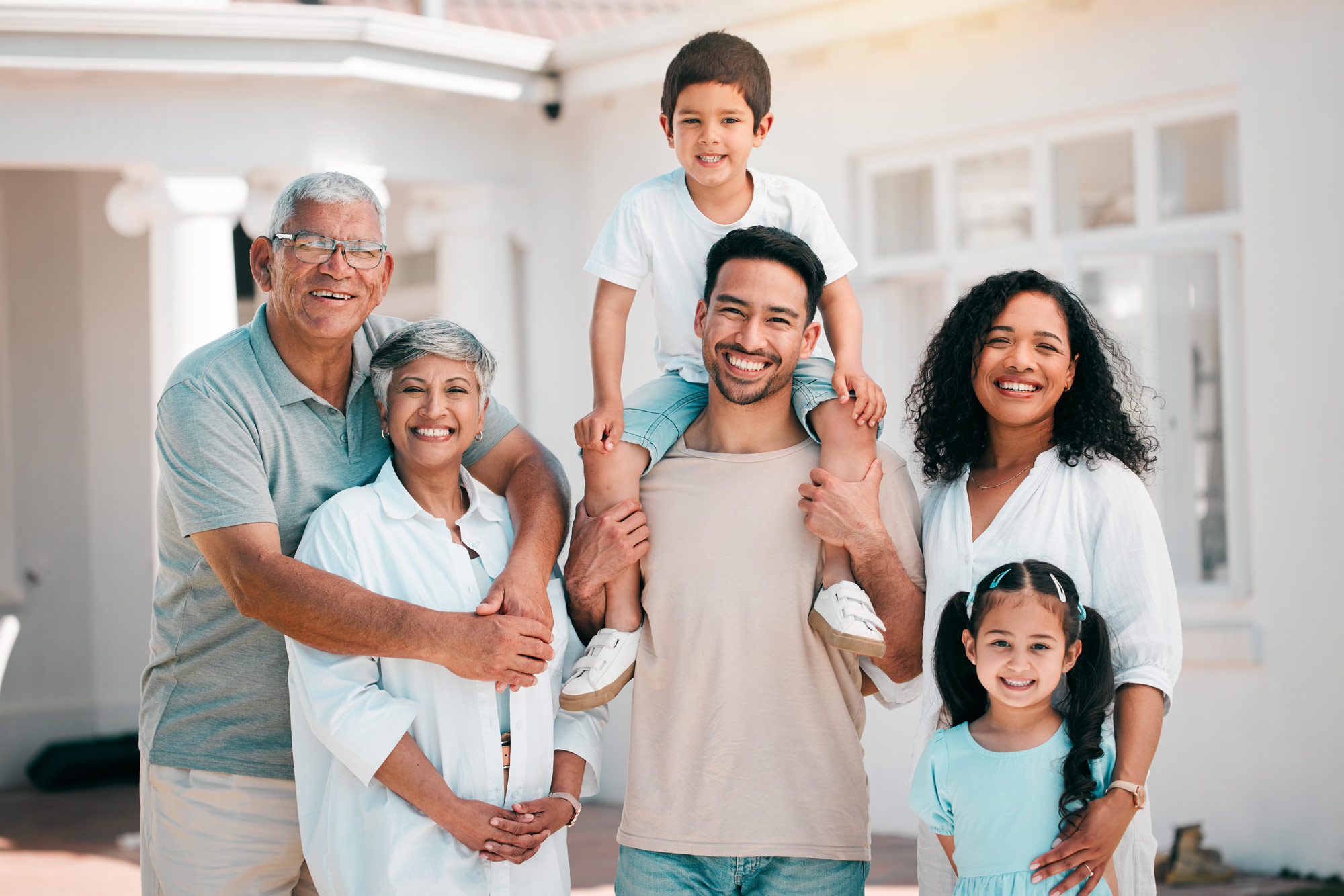 three generation family smiling