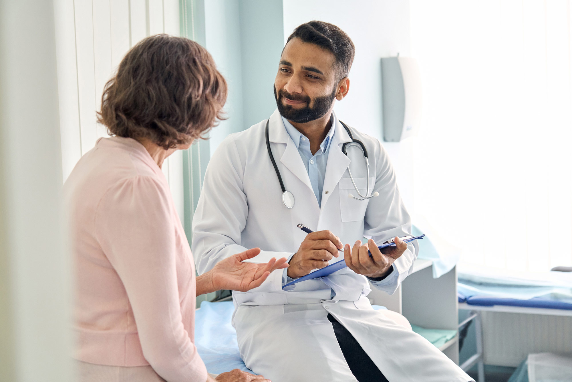 doctor discussing with patient