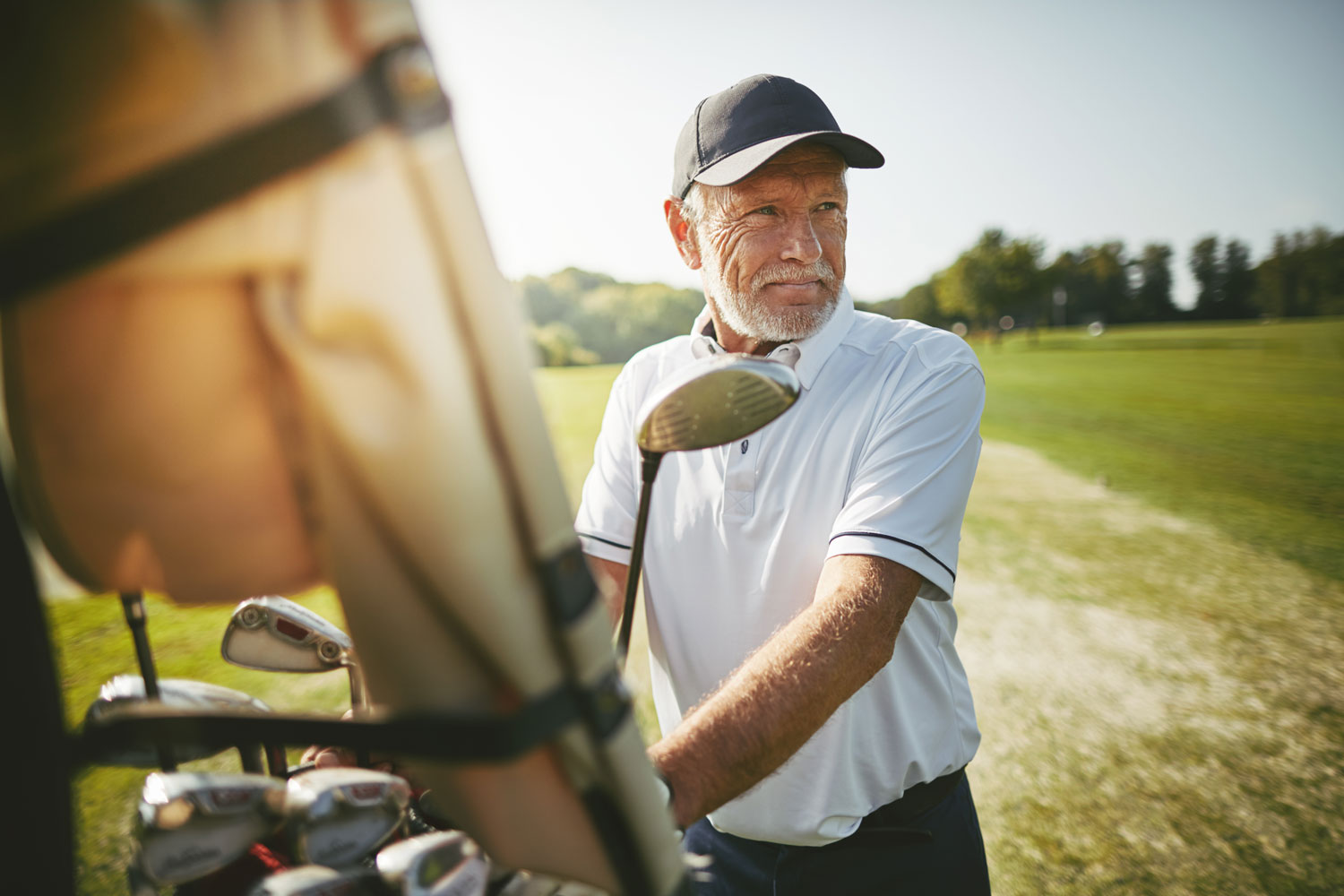 golfing man looking into distance