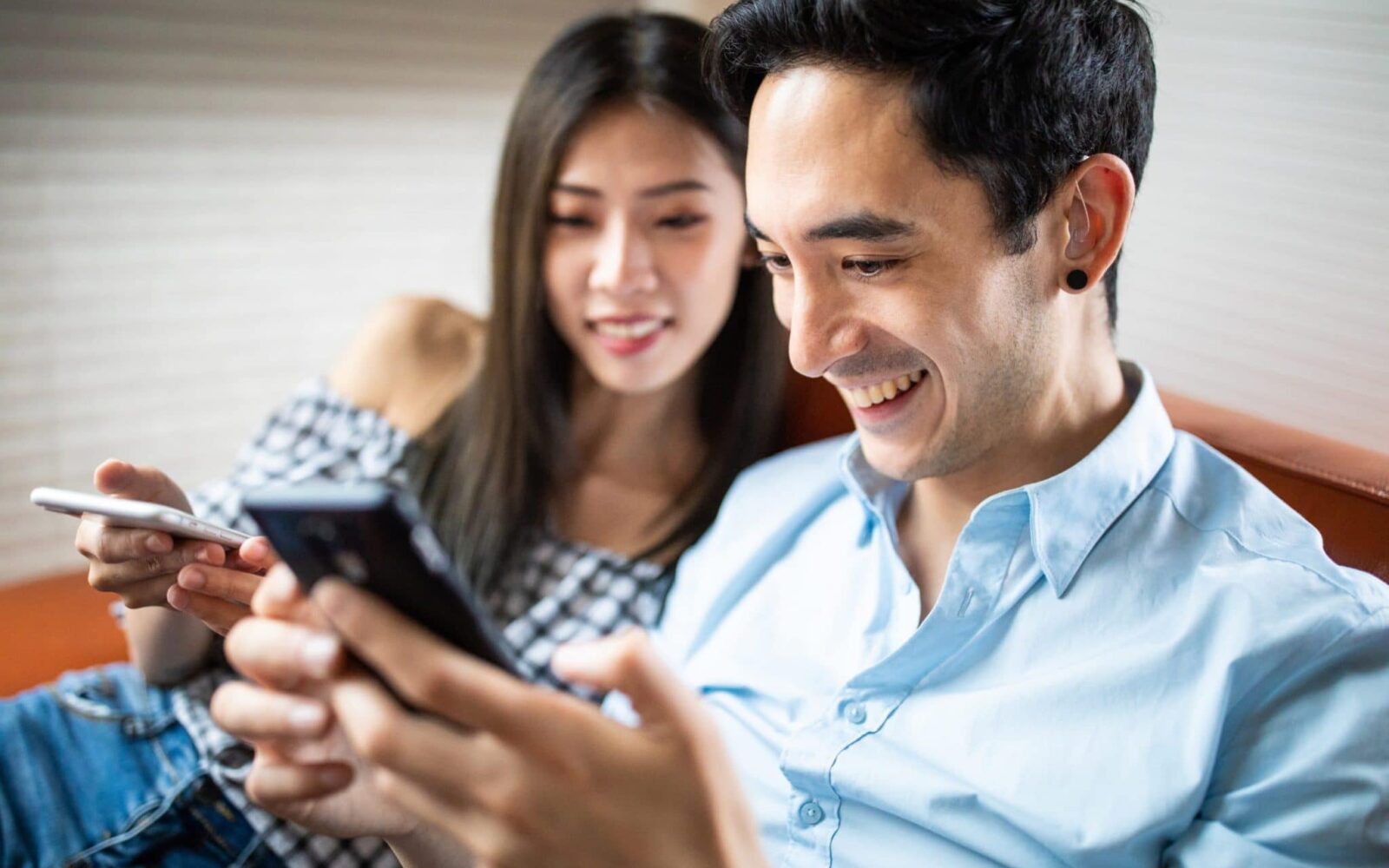couple relaxing hearing aids cleaning scaled