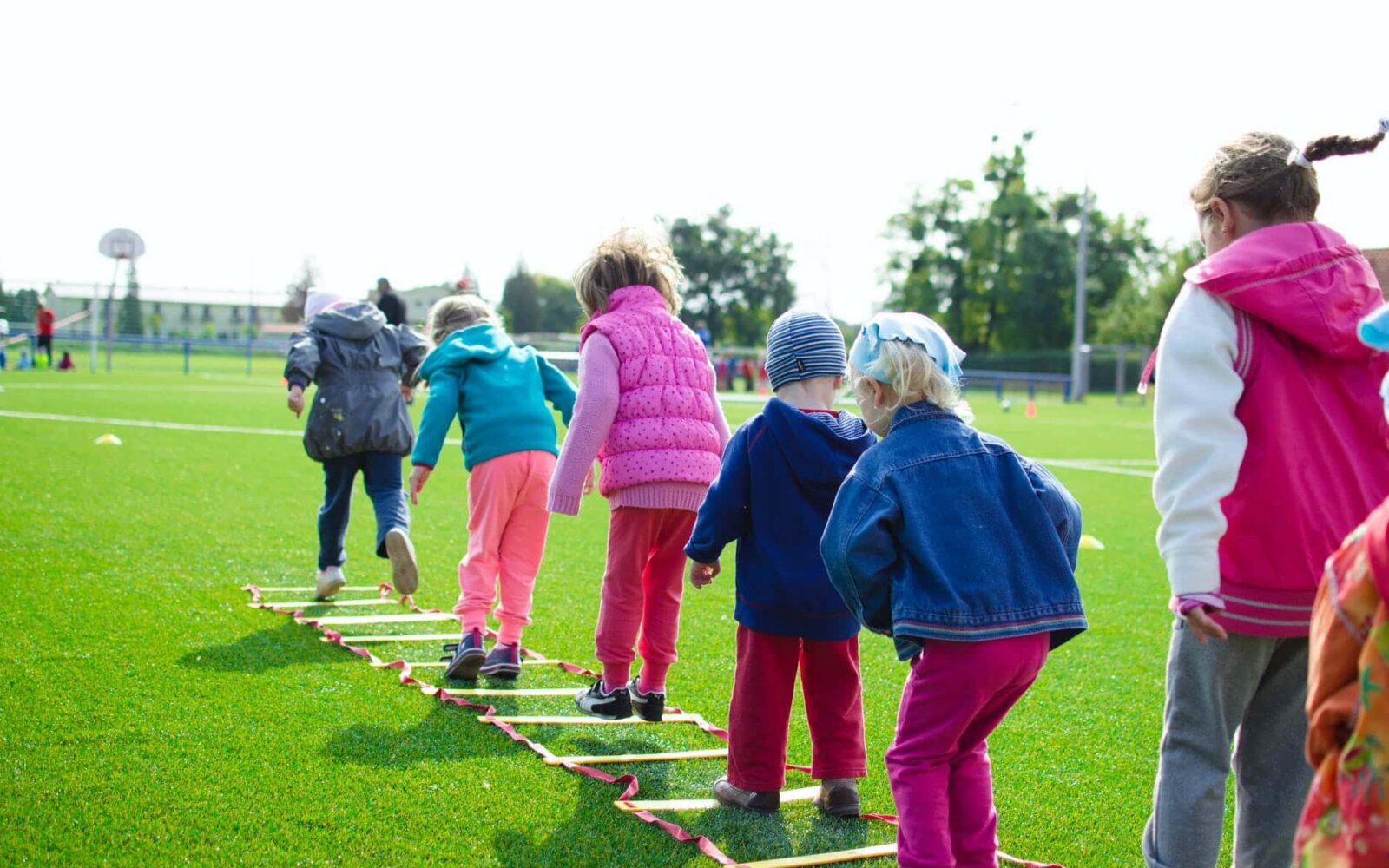 children playing teach hearing loss