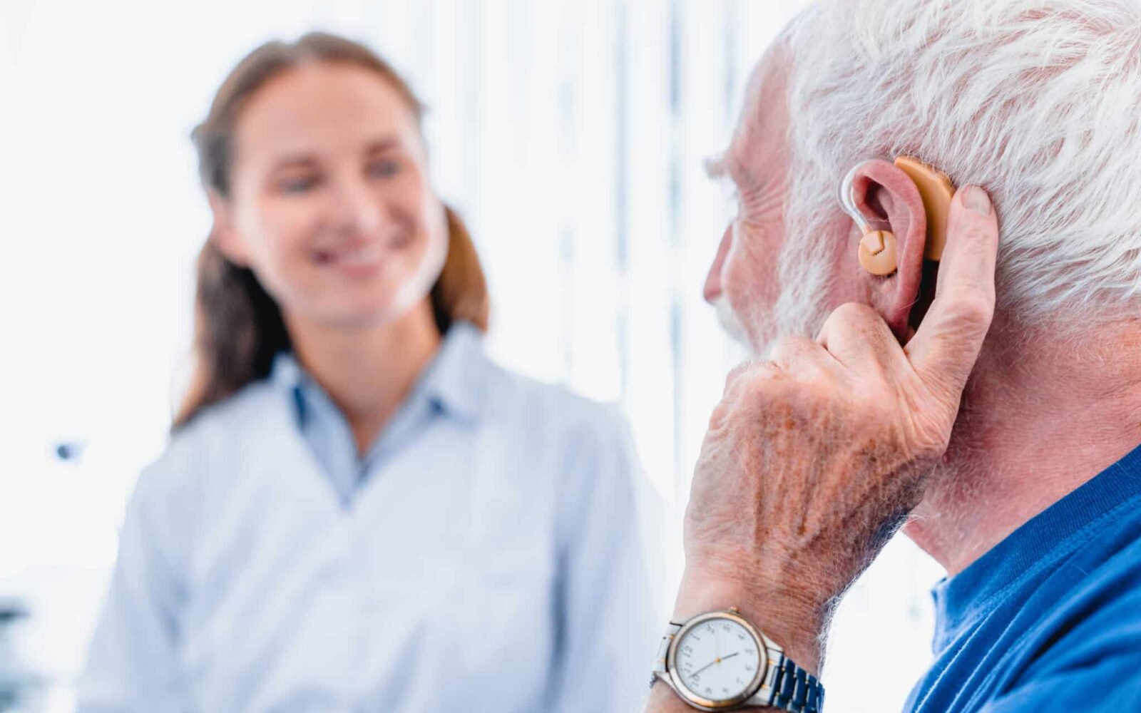 patient audiologist hearing aids