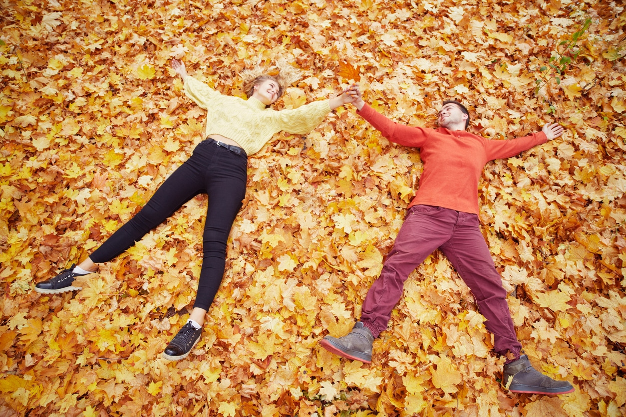 Young couple in an autumn forest