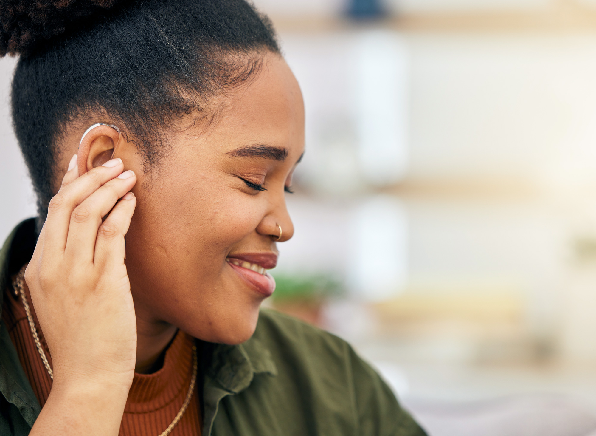 black women wearing hearing aid