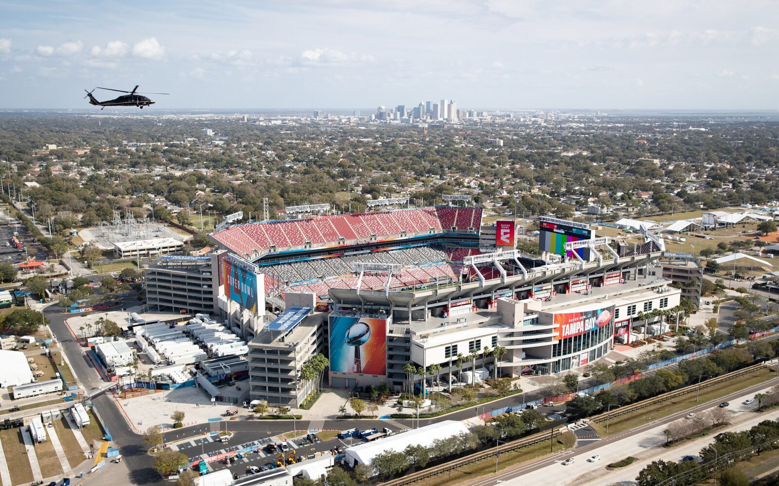 tampa sports stadium with city in background