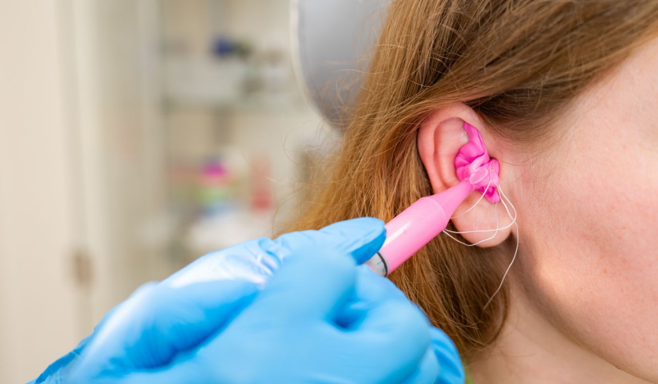 custom hearing protection ear mold of young woman