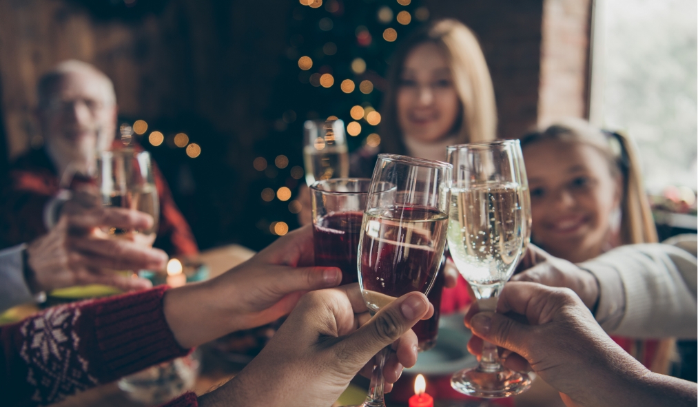 events new years family cheersing for new years