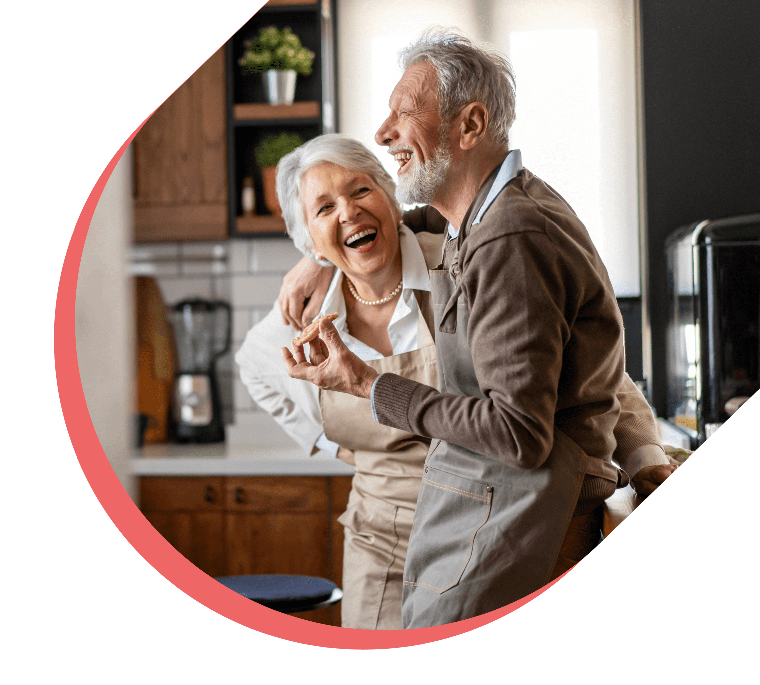 hero banner senior couple cooking in kitchen laughing min