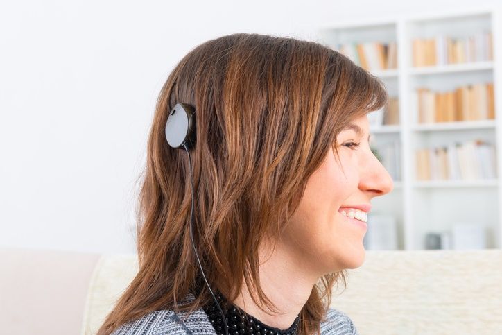 woman wearing a cochlear implant