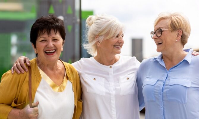 cta group of mature friends laughing