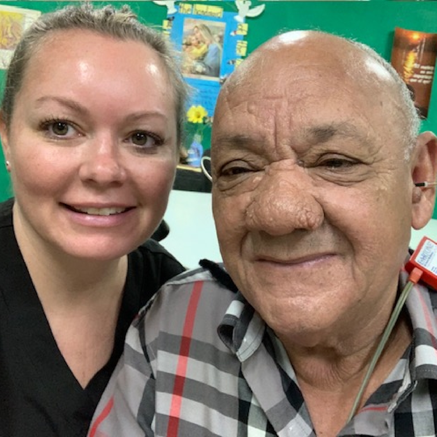 Sara Cable Cooper BC HIS with patient on missin trip