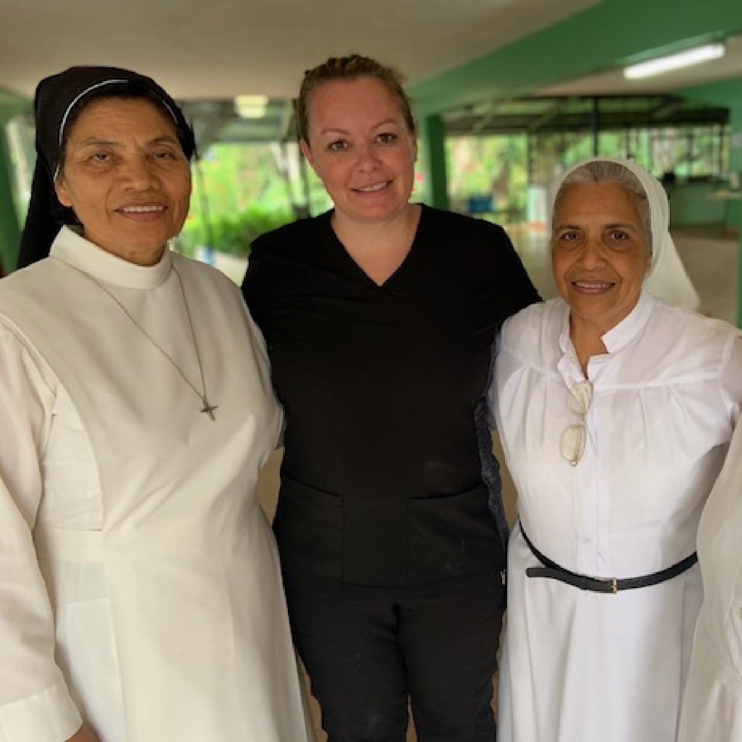Sara Cable Cooper BC HIS with nuns on missin trip