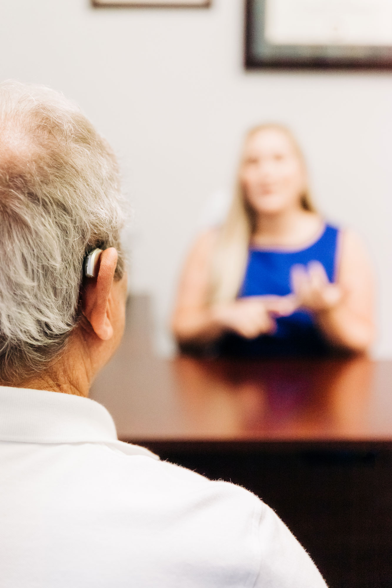 Dr Dana Coveney Consultation with Patient for hearing aids