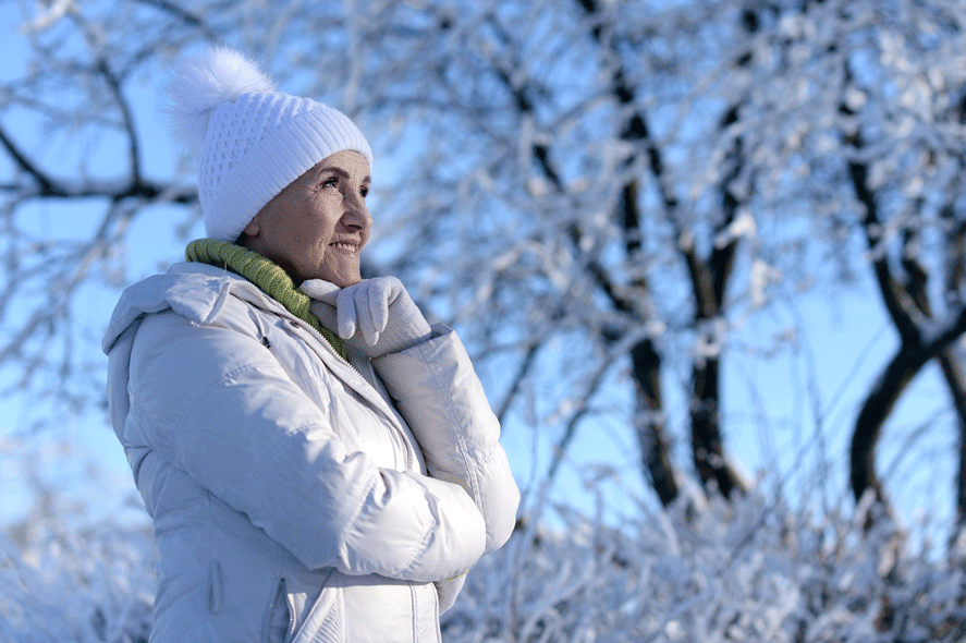 WOmen outdoors with hearing aids