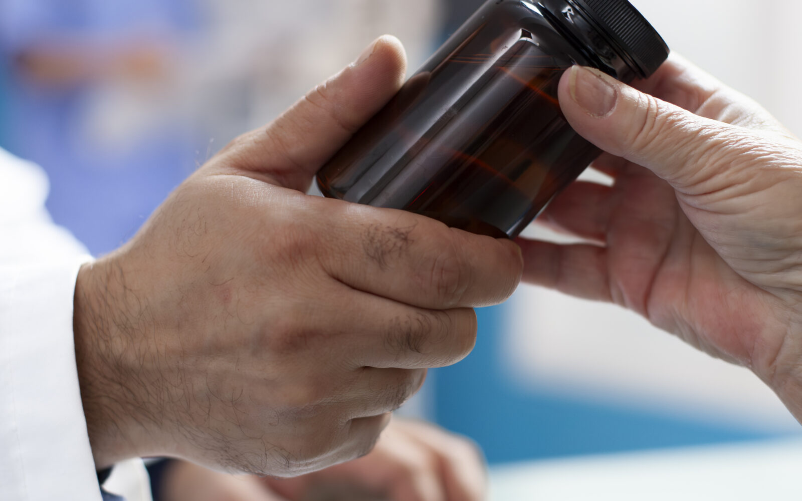 Doctor gives medicine to patient