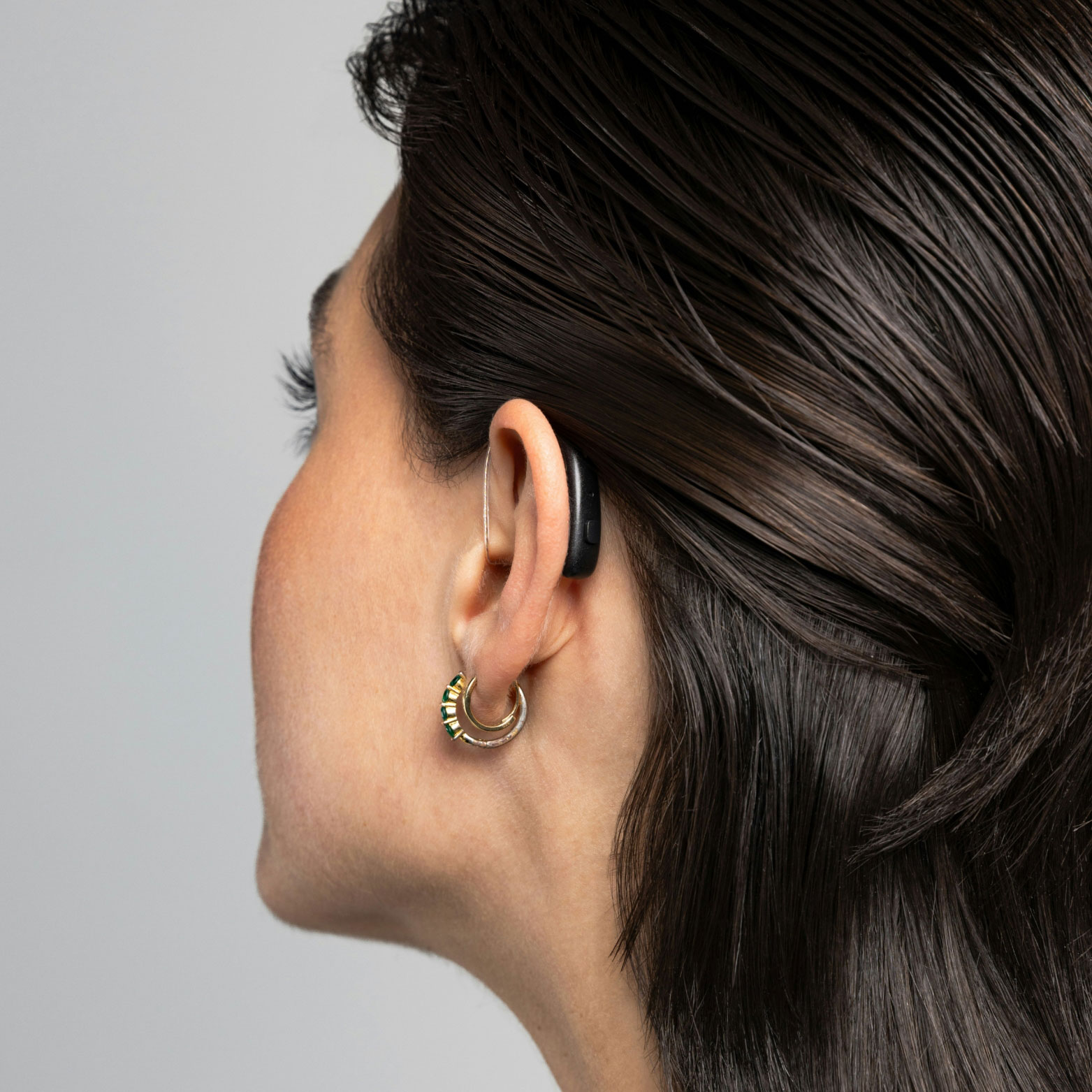gn woman wearing bte hearing aid sq