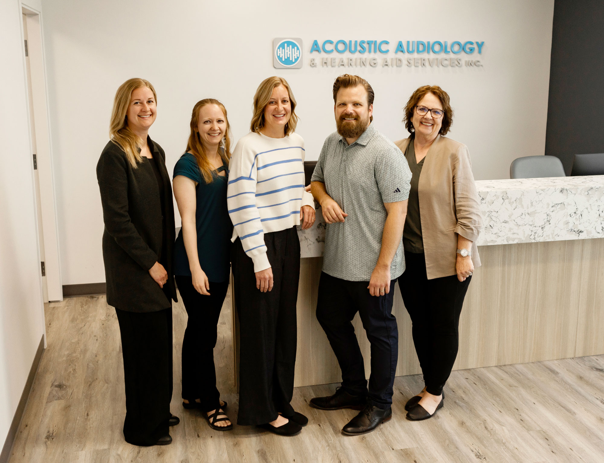 accoustic audiology staff group photo