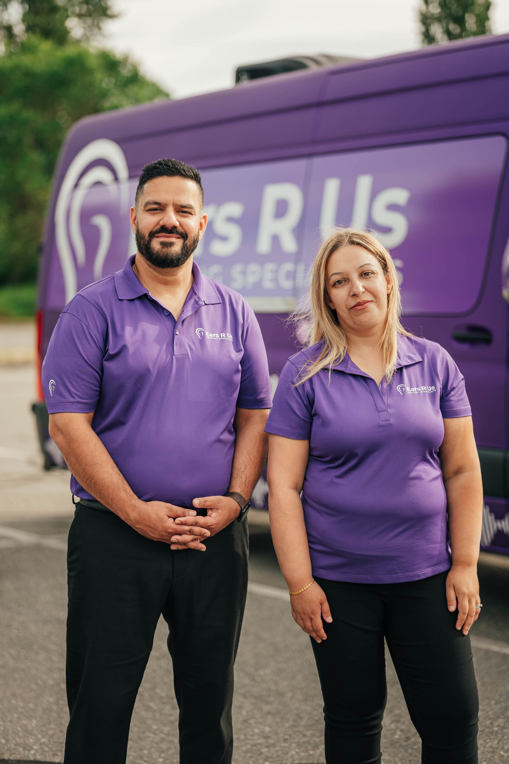 Ears R Us staff in front of van