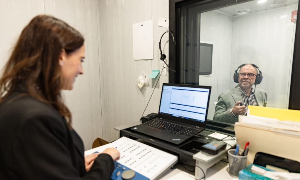 image hearing test sound booth practitioner and patient