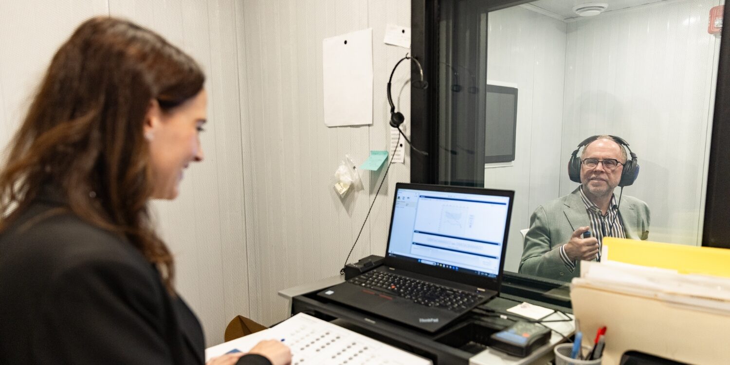 image hearing test sound booth practitioner and patient