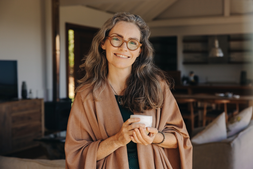 Portrait,Of,A,Happy,Senior,Woman,Smiling,At,The,Camera