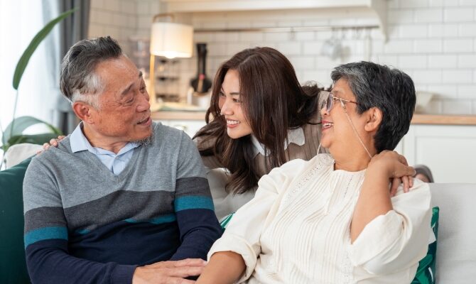 cta stacked family talking on couch in living room