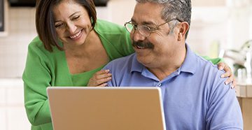 man-woman-smiling-working