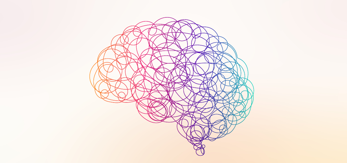 Abstract brain shape made of overlapping colorful circles on a light background.
