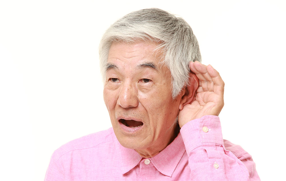 Man with Hand to Ear