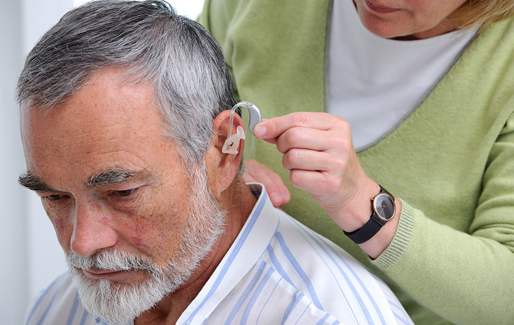 Man with Hearing Aid