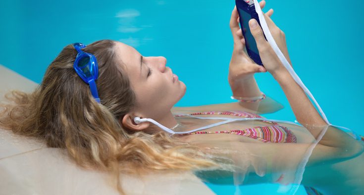 swimmerwithheadphones hero