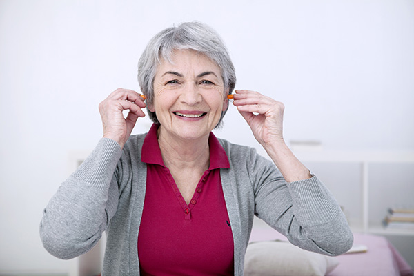 Woman with Earplugs