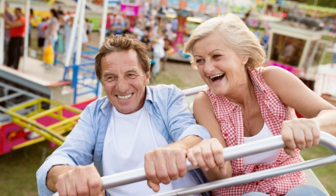 event image mature couple rollercoaster
