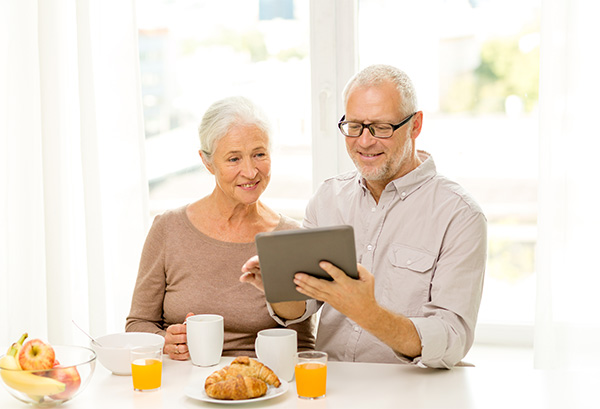 Elderly Couple on Tablet