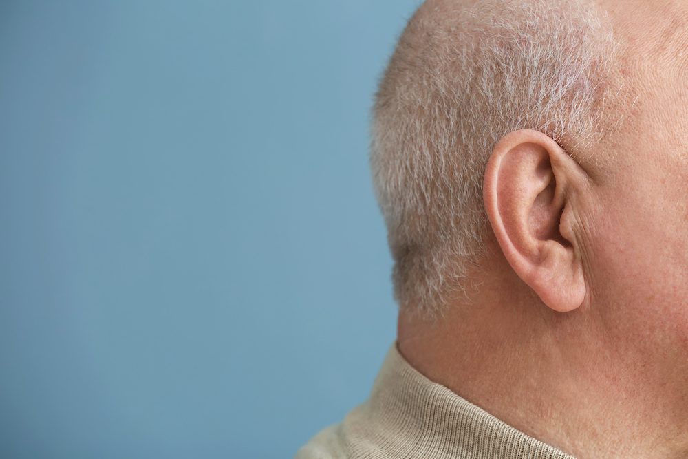 side of mans head and ear