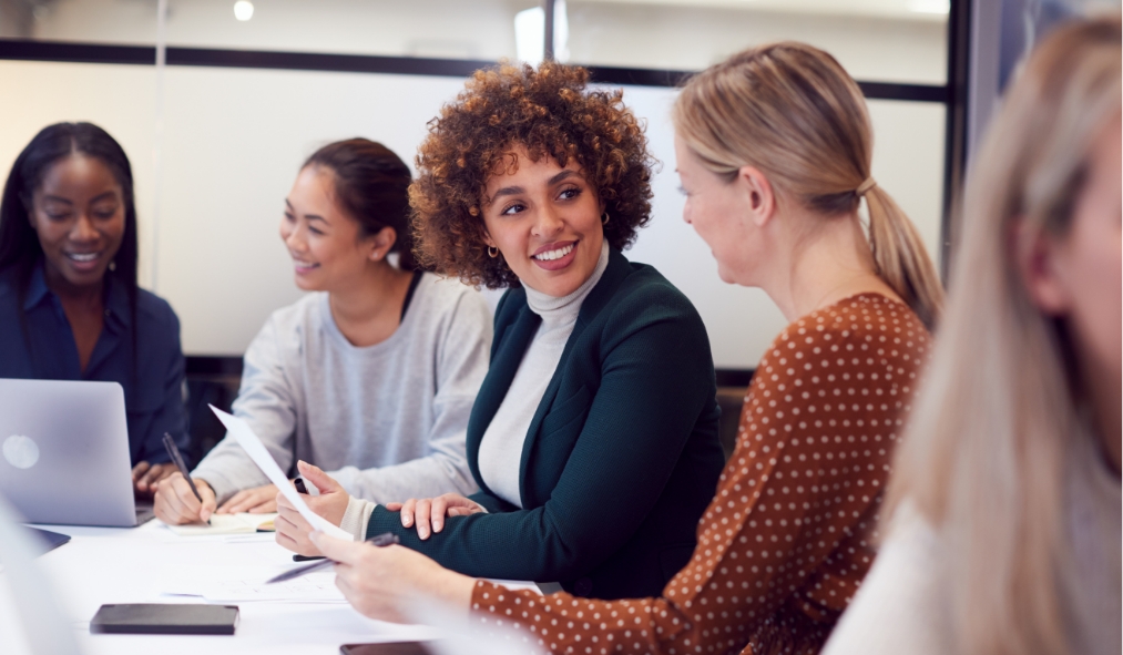 women in business conference table